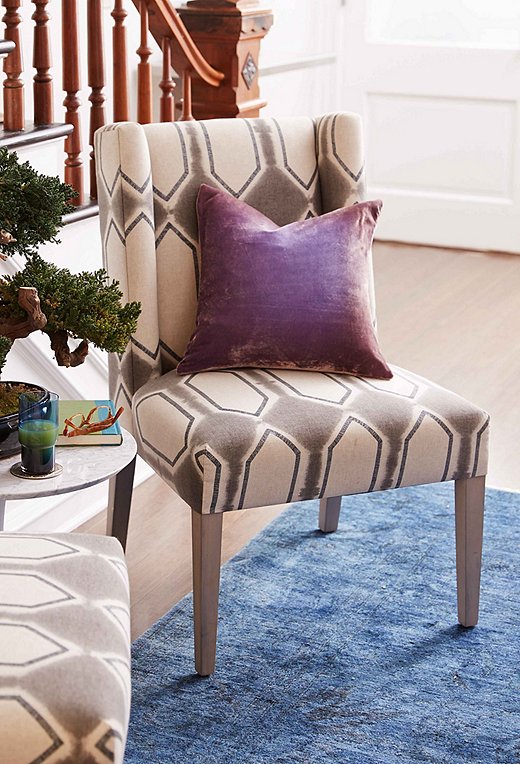 Set away from the main living area, this pair of chairs creates a spot for cozy conversations or always-welcome me time.
